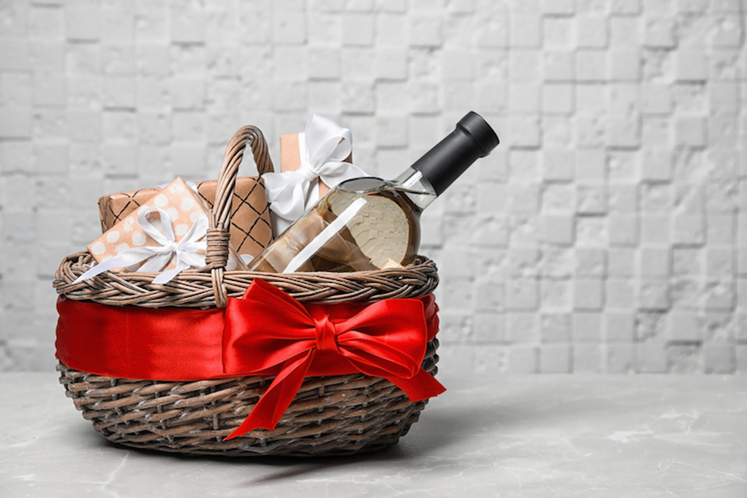 Gift,Basket,With,Bottle,Of,Wine,On,Light,Background.,Space