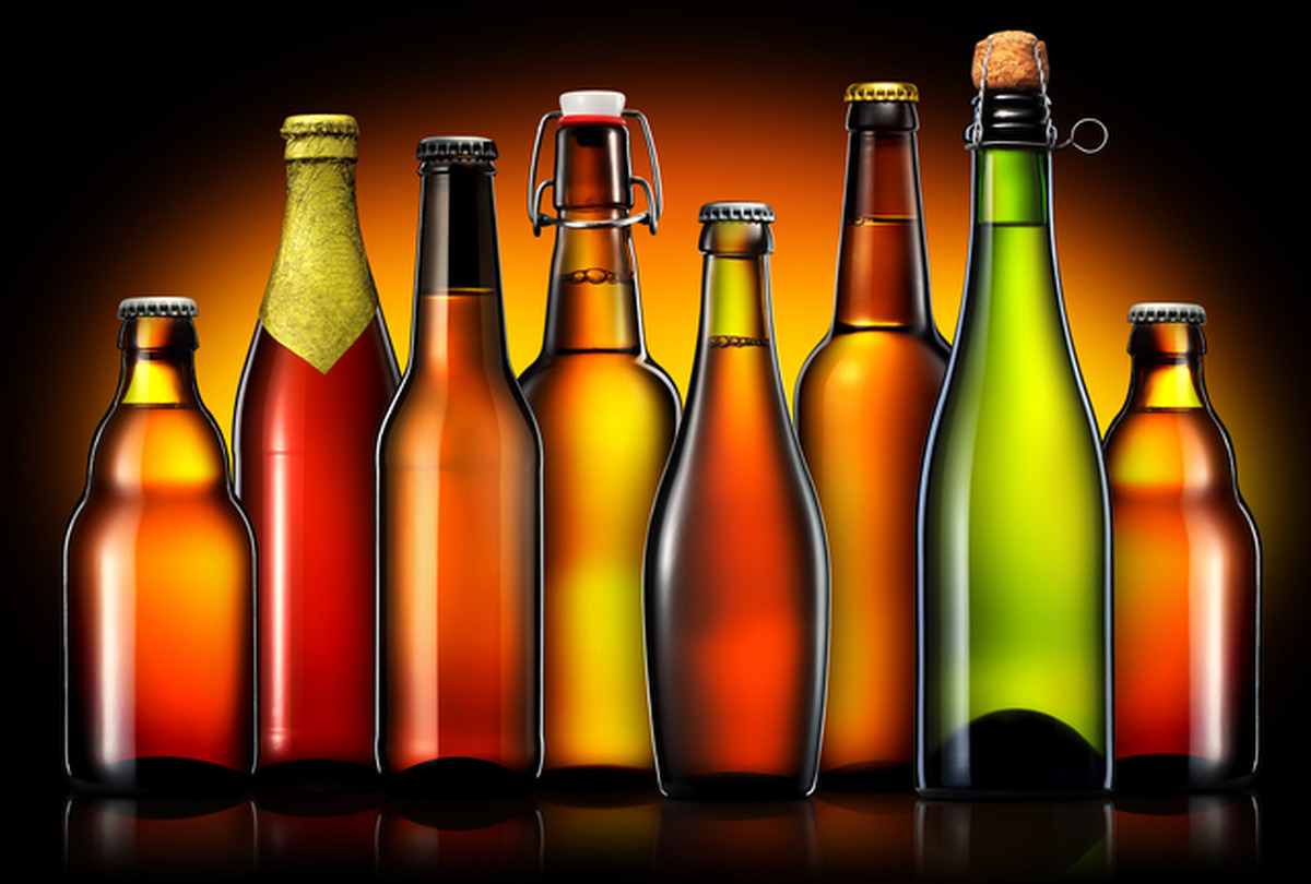 Set of beer bottles isolated on black background