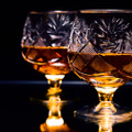Shot,Of,A,Cut,Crystal,Glass,Containing,Brandy.