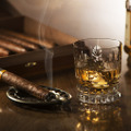 Glass,Of,Whiskey,With,Ice,Cubes,And,Smoking,Cigar,On