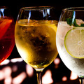 Cocktails: aperol spritz, sprizz (spriss), Martini royale. (dark background). Sparkling wine. Champagne.